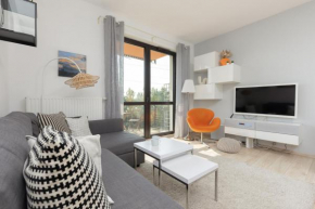 Symboliczna Apartment with Balcony & Parking Warsaw by Noclegi Renters